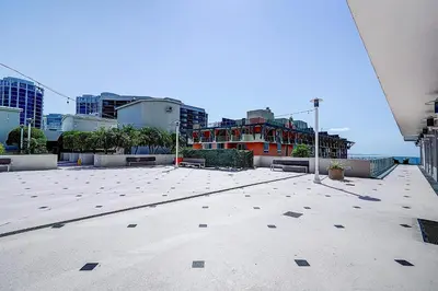 a large parking lot in a city with buildings at Coconut Grove Gorgeous Bay View 1 bedroom Condo Includes Parking in Miami