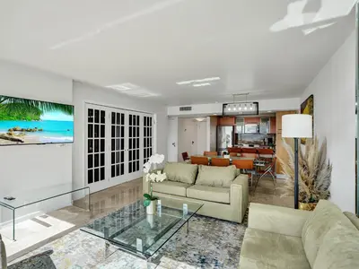 a living room with a couch and a table at Beach Resort condo 921 in Miami Beach