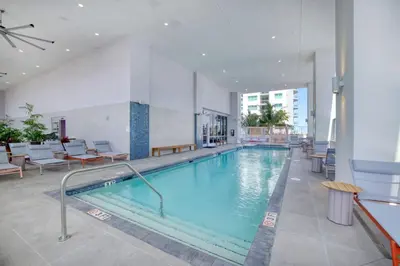 a large swimming pool in a hotel room at Downtown Luxury Studio Pool and Gym in Miami