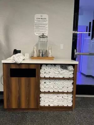 a counter with a pile of rolls of toilet paper at Ocean view Studio Pool and gym in Miami