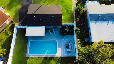 an overhead view of a swimming pool in a yard at Stylish Pool Home in Hollywood