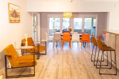 a dining room with a table and chairs at Private Villa with Pool and Sauna in Dania Beach