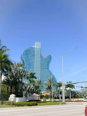 a large building with a guitar shaped building at Cozy apartment near Seminole Hard Rock Cafe in Hollywood