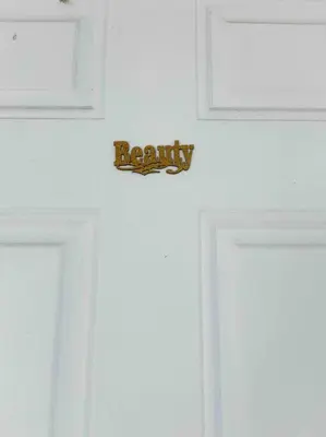 a door with a sign that says beauty on it at Cozy apartment near Seminole Hard Rock Cafe in Hollywood