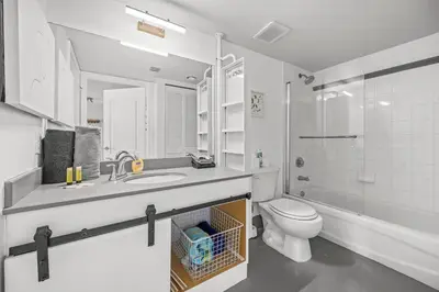 a bathroom with a sink and a toilet and a shower at Luxe 1 BDR • 32th Floor • Brickell • Ocean Views in Miami