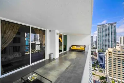 a balcony with a view of a city skyline at Luxury 1 BDR • 30th Floor • Brickell • Water Views in Miami