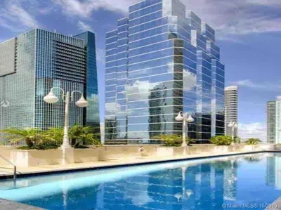 a rendering of a building with a swimming pool at Luxury 1 BDR • 30th Floor • Brickell • Water Views in Miami