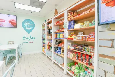 a grocery store aisle with shelves of food at Apt w/2 Queen Beds & Canal View at Tides in Hollywood