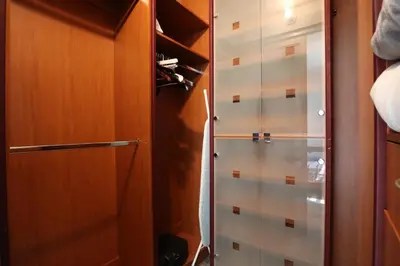 a closet with a glass door in a room at 2Bed/2Bath, 4QueenBeds & OceanView at Tides in Hollywood