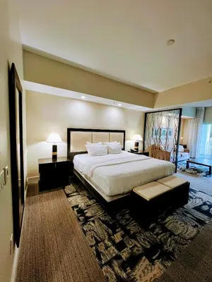 a large bedroom with a large bed and a rug at Doral Pool 1107 by Wave Properties in Miami