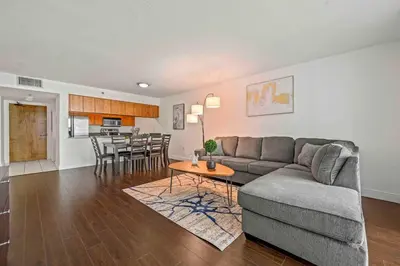 a living room with a couch and a table at Comfy 28th floor • Brickell • Ocean & City Views in Miami