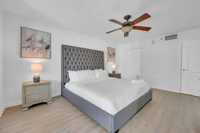 a bedroom with a bed and a ceiling fan at Stunning 1 BDR 1 BTH • Brickell • Bay & City Views in Miami