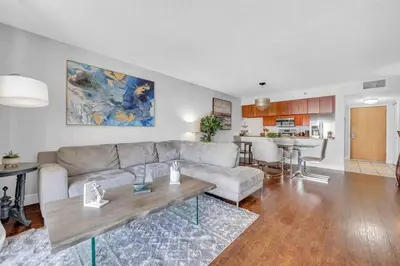 a living room with a couch and a table at Beautiful 1 BED 1 BTH • Brickell in Miami