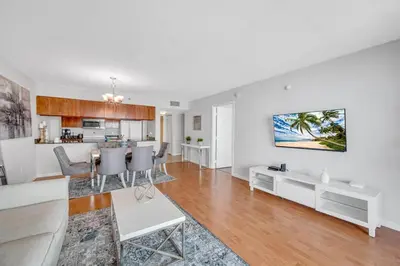 a living room with a couch and a table at 35th floor 1 BED 1 BTH • Brickell • Ocean View in Miami