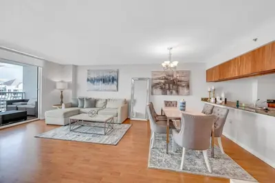 a kitchen and living room with a table and chairs at 35th floor 1 BED 1 BTH • Brickell • Ocean View in Miami