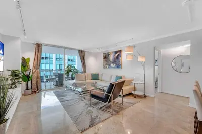 a living room with a couch and a table at PH 41st Floor 3 BED • Brickell • Ocean View in Miami