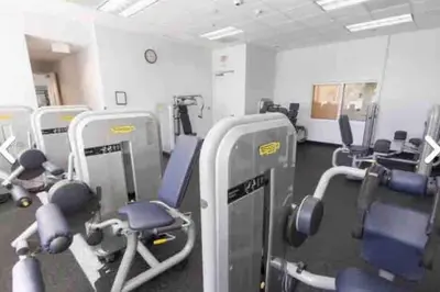 a gym with rows of exercise bikes and machines at LUX 1 BDR 1 BTH • Brickell • Pool & Ocean Views in Miami