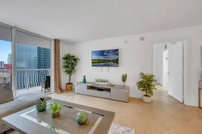 a living room with a couch and a table at Ocean view 1BR Condo Brickell-FreeParking in Miami