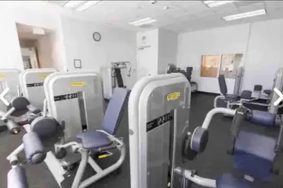 a gym with rows of chairs and machines at Spacious 36th FLR 1 BD 1 BT • Brickell • Bay View in Miami