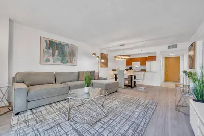 a living room with a couch and a table at Beautiful 1 Bed 1 Bath • Brickell • Bay View in Miami