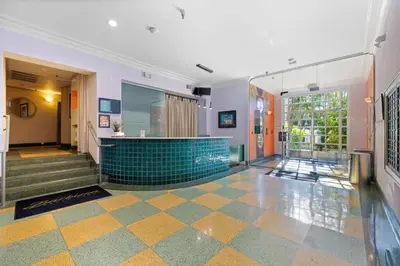 a lobby of a building with a tile floor at 1 Bedroom Jr Suite - Ocean Drive & 6th Str in Miami Beach
