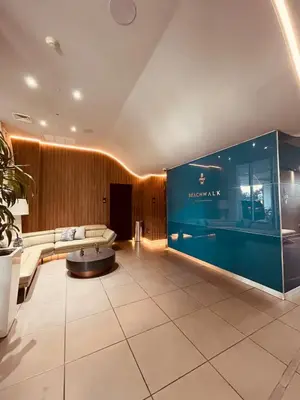 a large lobby with a couch and a table at Beachwalk 2 Bedrooms with Kitchen 2 Bathroom & Gym in Hallandale Beach