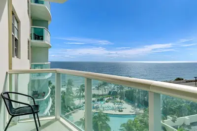 a balcony with a view of the ocean at PROMO Komffy Home with King Bed & Ocean View at Tides 7th floor in Hollywood