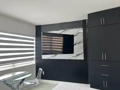 a room with a table and a chair and a mirror at VillaClara Studio-Little Havana in Miami