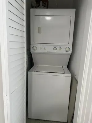 a white washer and dryer in a small room at VillaClara Studio-Little Havana in Miami