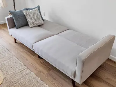 a couch in a room with a white wall at 3BR Newly Renovated In Miami 15 Min To Beach in Miami