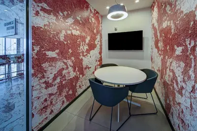 a room with a table and two chairs and a tv at Exceptional property in the heart on downtown Miami in Miami
