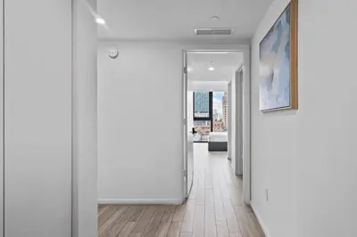 a hallway with a view of a living room at Majestic unit in the heart of Downtown Miami in Miami