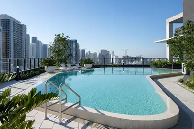 a swimming pool on the roof of a building at Blueground Wynwood pool gym nr Design Dist MIA-99 in Miami