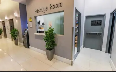 a store lobby with potted plants in a mall at Sublime 1 BED 1 BTH • Brickell BAY & CITY VIEW in Miami