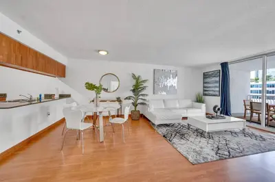 a living room with a white couch and a table at Sublime 1 BED 1 BTH • Brickell BAY & CITY VIEW in Miami