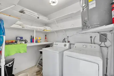 a laundry room with a washer and dryer at D'Mauchi House in Miami