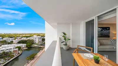 a living room with a view of a river at Luxurious Private Condo at 1 Hotel & Homes - 1545 in Miami Beach