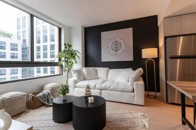 a living room with a couch and a table at Modern & Luxury Apt in Wynwood in Miami