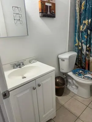 a bathroom with a white sink and a toilet at B2 Best Value on Private Bedroom with Private Bathroom in Little Havana, Miami in Miami