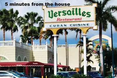 a sign for a restaurant in front of a building at B3 Best Value on Private Bedroom with Private Bathroom in Little Havana, Miami in Miami