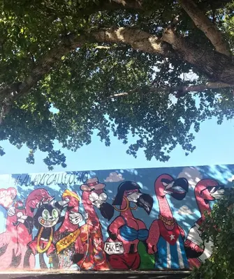 a mural on a wall under a tree at B4 Best Value on Private Bedroom with Private Bathroom in Little Havana, Miami in Miami