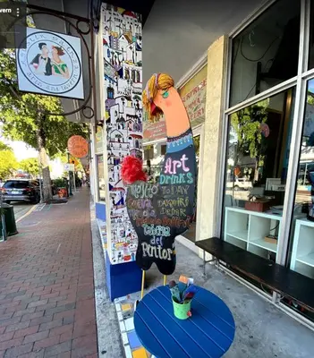 a statue of a chicken standing outside of a store at B6 Best Value on Private Bedroom with Private Bathroom in Little Havana, Miami in Miami