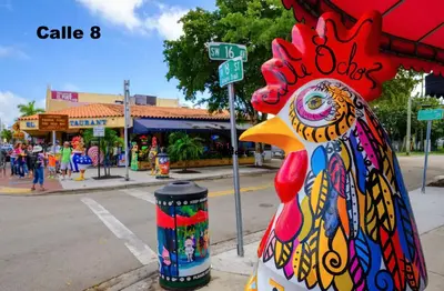 a chicken statue sitting on the side of a street at B6 Best Value on Private Bedroom with Private Bathroom in Little Havana, Miami in Miami