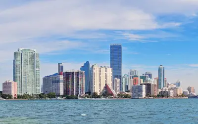 a view of a city from the water with buildings at Vibrant Little Havana Apt with Parking in Miami