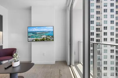 a living room with a view of the ocean at High Style Living in the Heart of Miami in Miami
