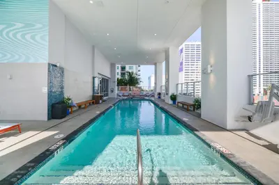 an indoor swimming pool in a building at High Style Living in the Heart of Miami in Miami