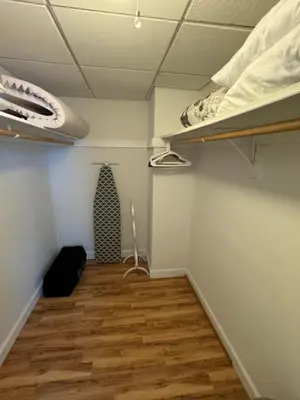 a room with two bunk beds and a wooden floor at Tropical ocean view 1 bedroom in Hollywood