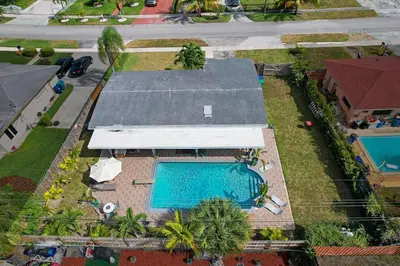 an overhead view of a house with a swimming pool at Dolce Vita Hideaway Pool House by Pako Stays in Miami