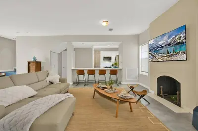 a living room with a couch and a table at Stunning Home LifeStyle Miami in Miami