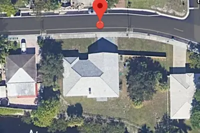 an aerial view of a house with a red marker at Spacious House in Fort Lauderdale - Minutes from Beach in Fort Lauderdale